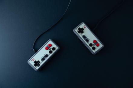 Illustration of Exploring the Evolution of Game Controllers Over the Years